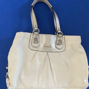 White and silver Coach bag